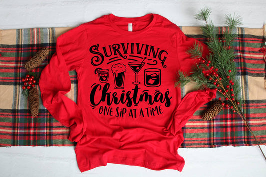 Womens Long Sleeve T-shirt "Surviving Christmas One Sip At A Time"